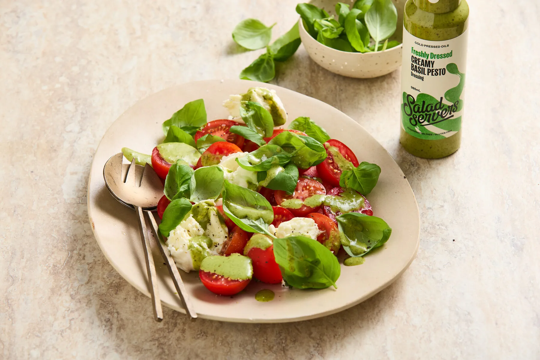 Creamy Basil Pesto dressing drizzled over a fresh dish